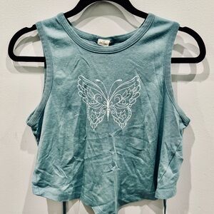 Beautiful blue butterfly 🦋 Open back crop top from Urban Outfitters 🌀